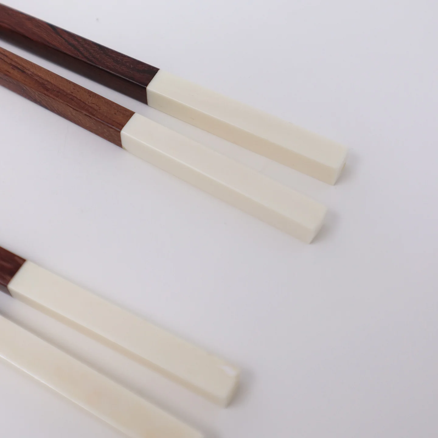 Sarah Petherick Red Wood Chopsticks & Rest / Set of 2 / White Bone - Image 4